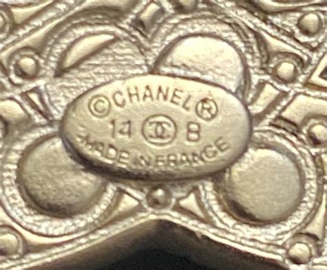 how to tell fake chanel jewelry|authentic chanel jewelry stamp.